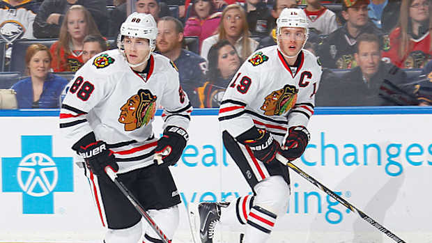 patrick-kane-jon-toews-2.jpg
